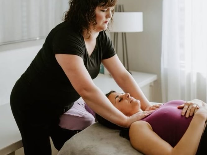Woman finds stress relief through therapeutic massage.